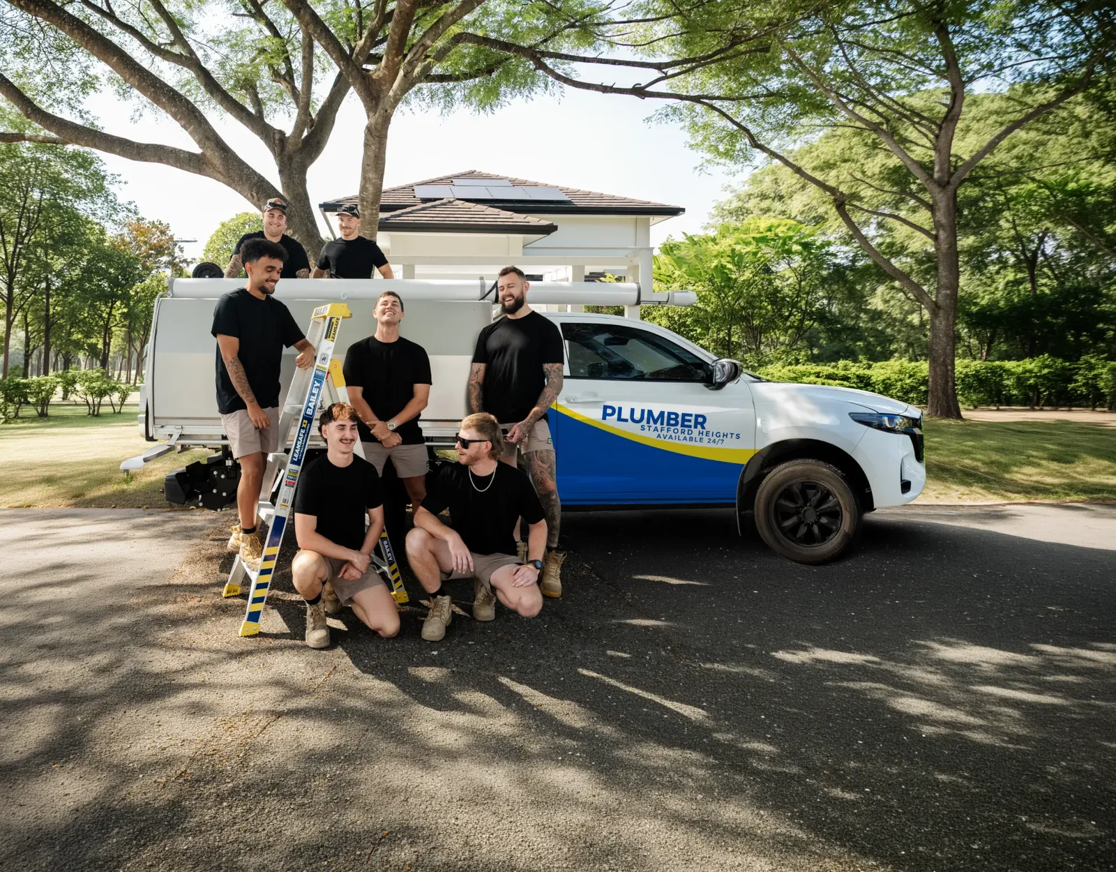 Plumber Stafford Heights ute and team